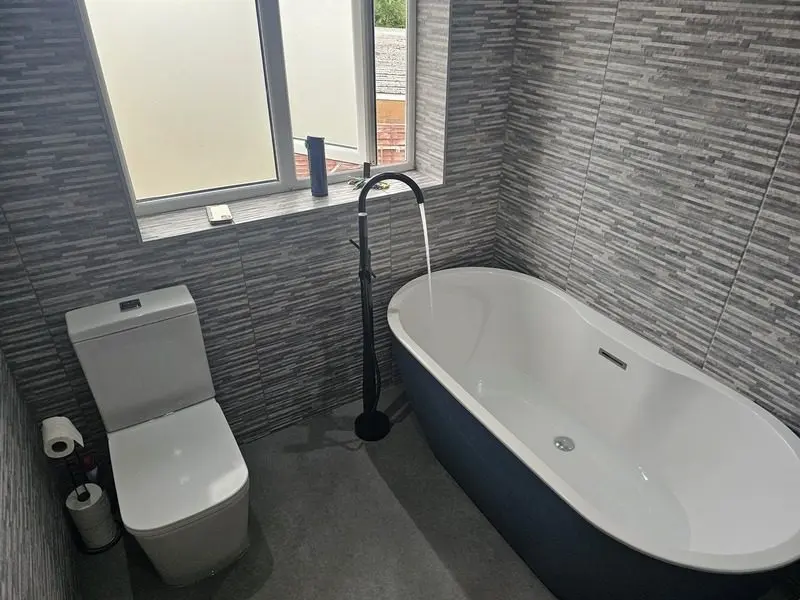 Bathroom — freestanding bath · black tap